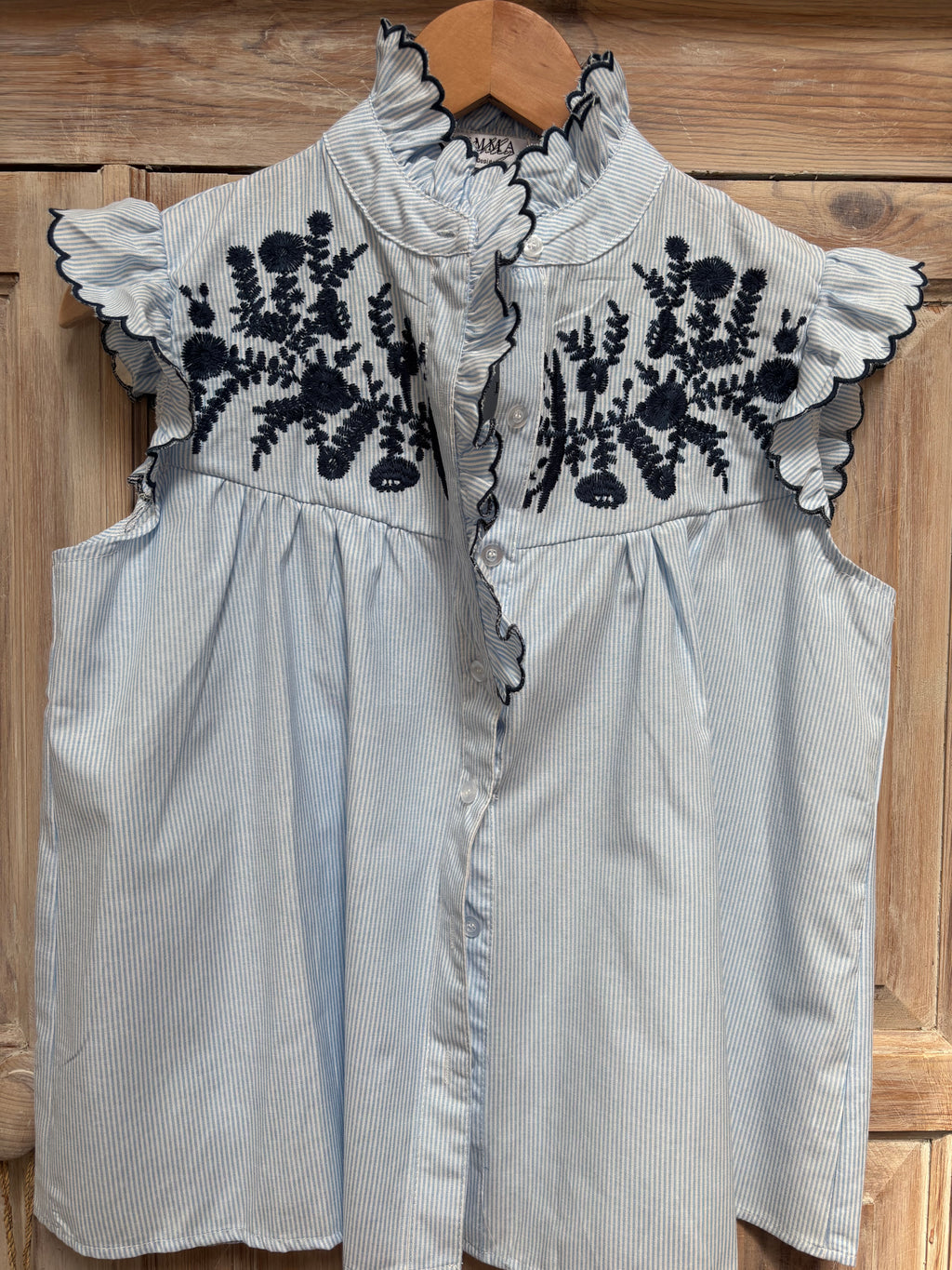 Frill neck shirt with Embroidery detail
